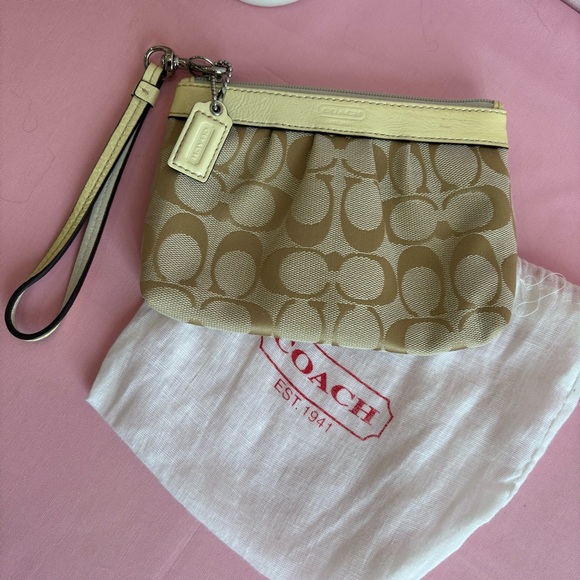 Coach Handbags - Coach Tan and Cream Signature Wristlet with Dust Bag